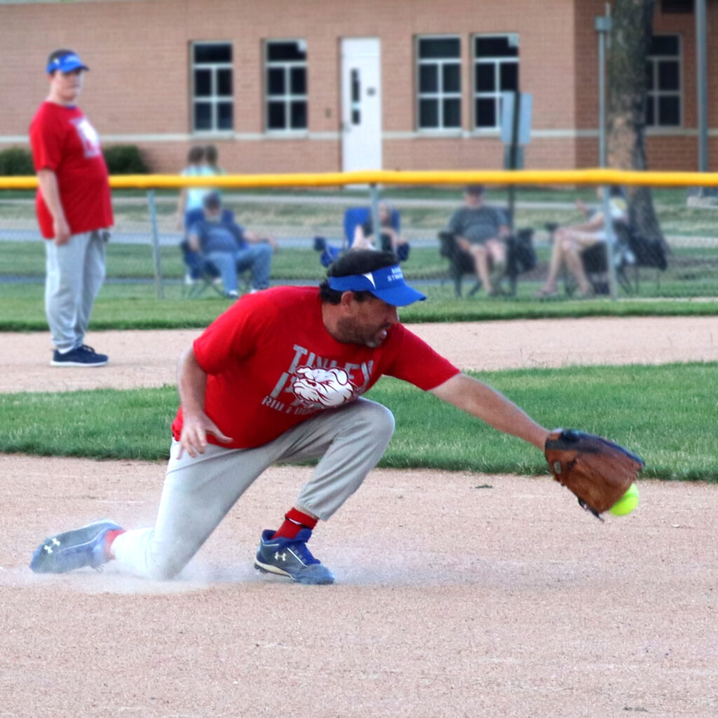 SSSRA Stingrays Softball athlete catches ball.