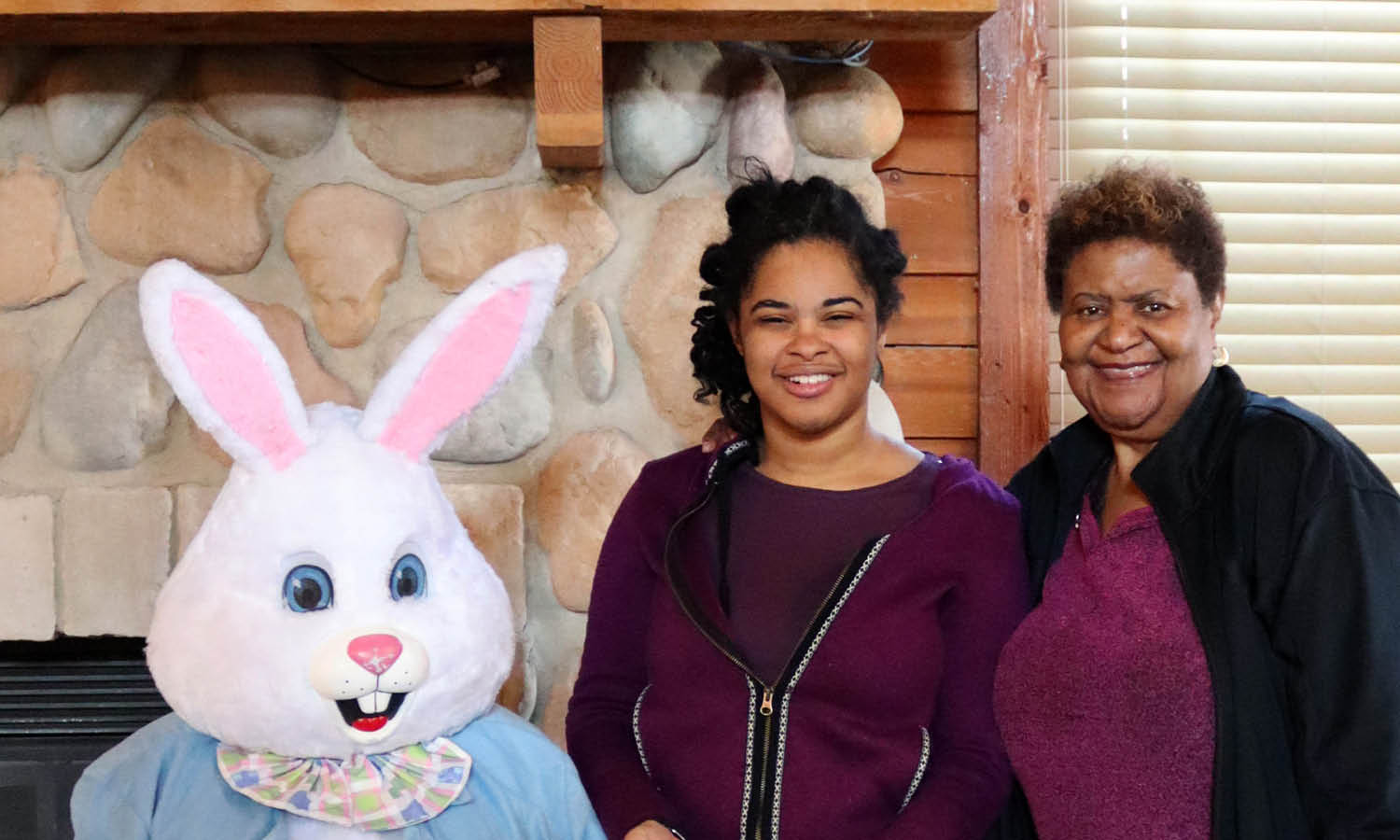 Two family members pose with the Bunny