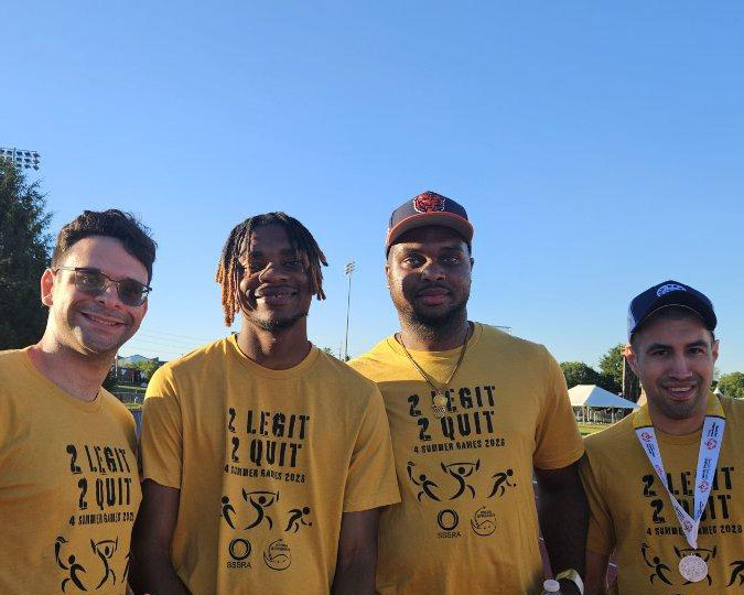 4 SSSRA athletes smiling for a picture.