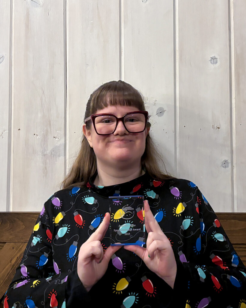 Stingrays athlete holding award