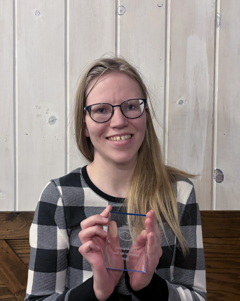 Stingrays athlete holding award