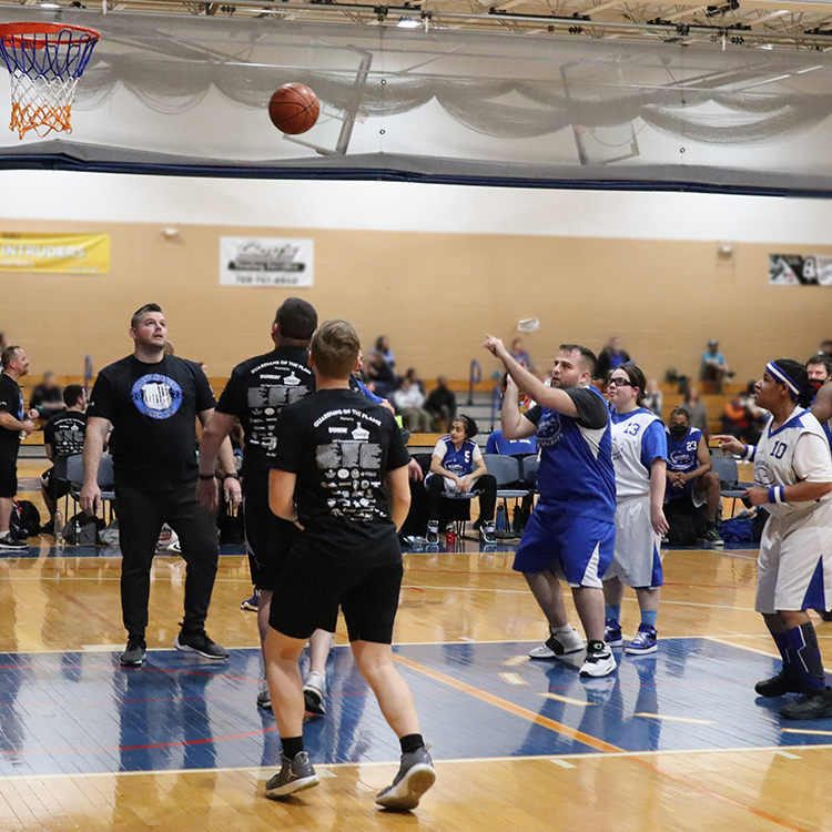Stingrays athlete shoots a basket.