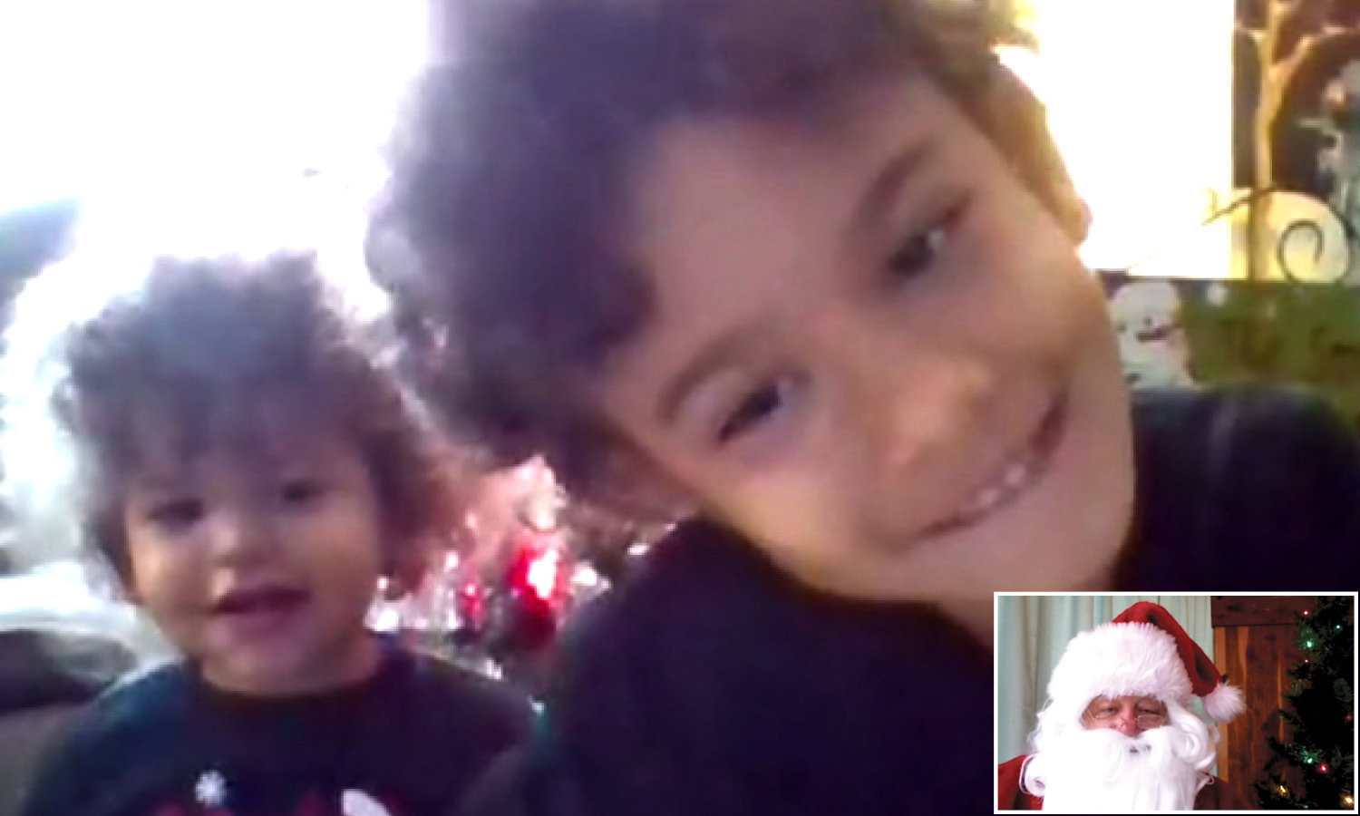 Two boys on Zoom talking with Santa
